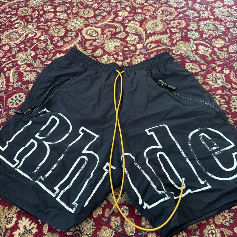 Rhude Black Perforated Shorts with Yellow Detail